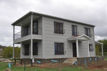 Двоповерховий сталевий будинок