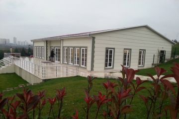 Соціальна будівля Будиночки на озері Ардичли